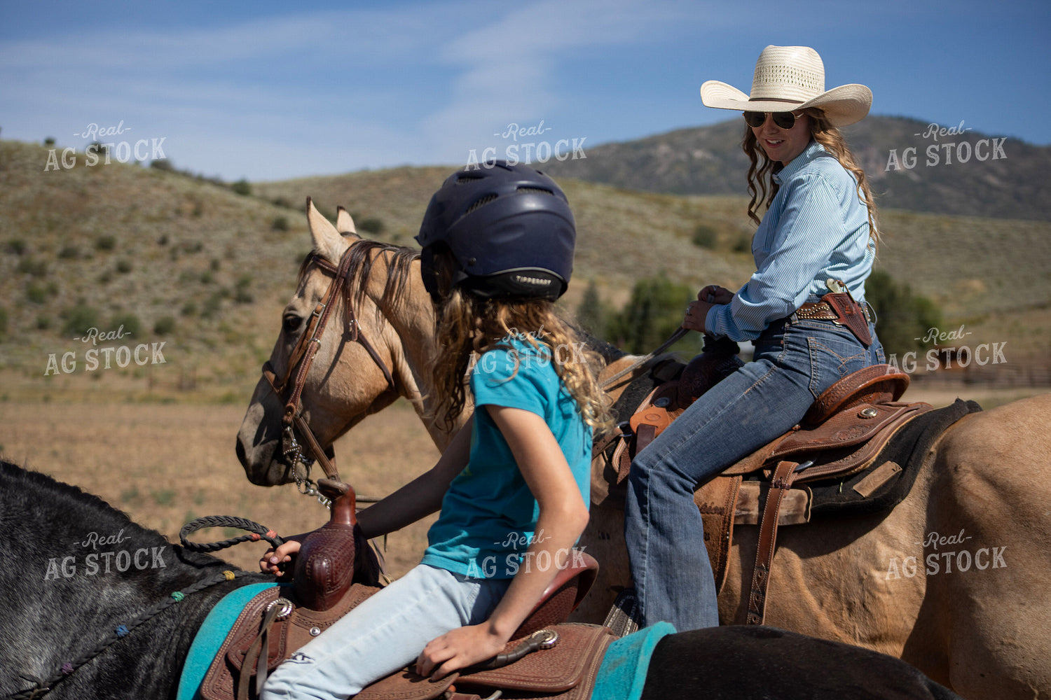 Cowgirls on Horseback 117435