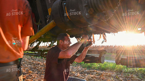 Farmer Collapsing Legs on Combine Head 25524
