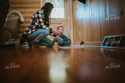 Farm Mom Putting Shoes on Farm Kid 5006
