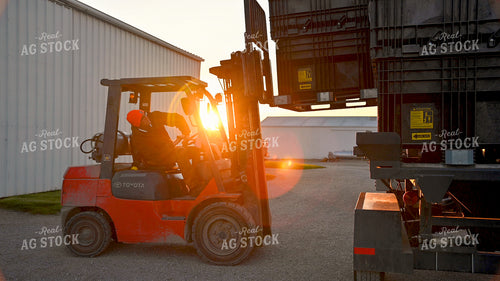 Loading the Seed Tender with the Skidsteer 25326