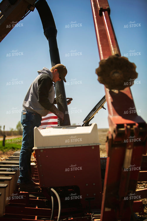 Farmer Filling Planter 6367