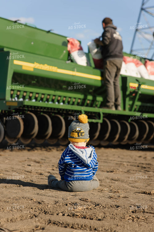 Farm Kid Watching Farmer Fill Seeder 152864