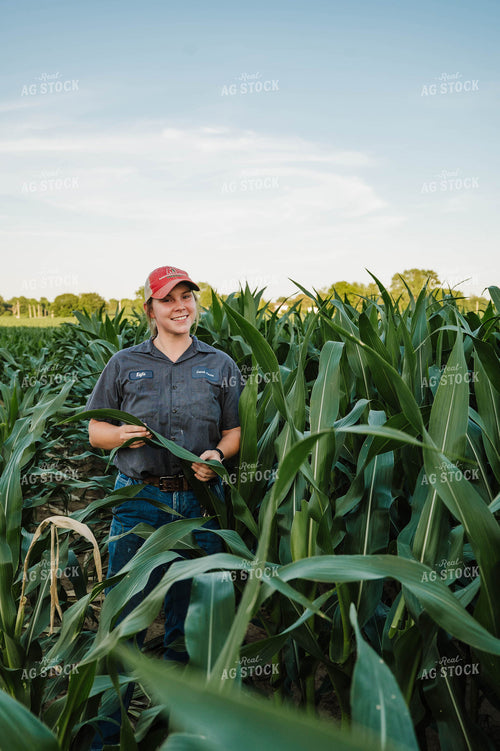 Female Farmer Checking Corn 115290