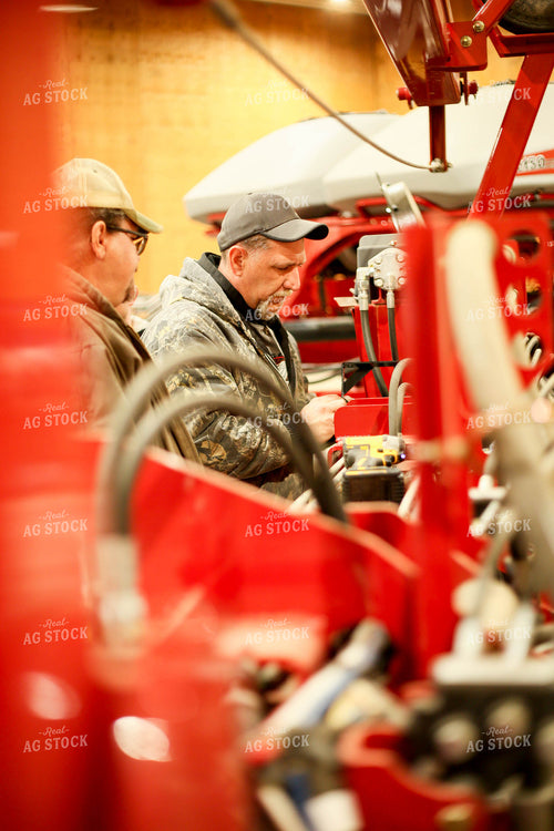 Farmers Fixing Planter 161144