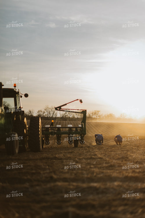 Farmers Checking Soil in Field 7446
