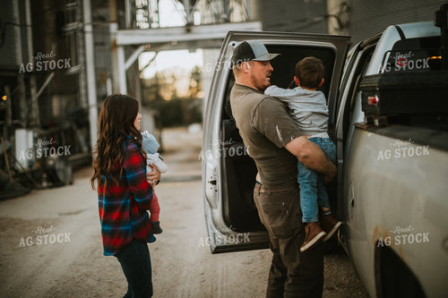 Farmer, Farm Wife, and Baby at Bin Site 5115