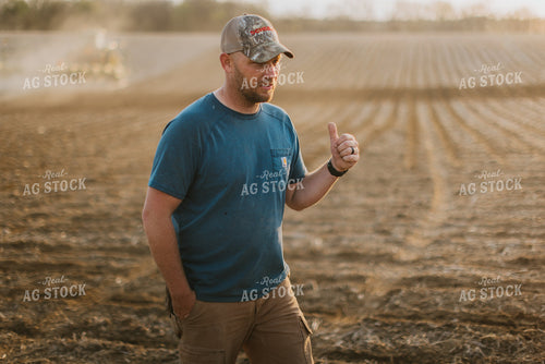 Farmer Walking in Field 7455