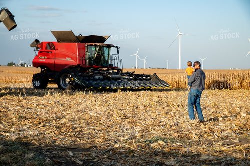 Grandson and Grandfather Farmer in Field 25817