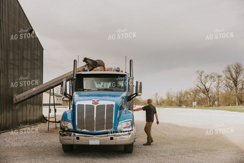 Farmer Approaches Truck 7545