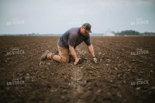 Farmer Checking Seed Depth 5678