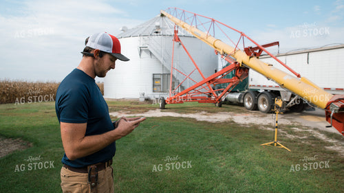 Farmer Using Phone 26255