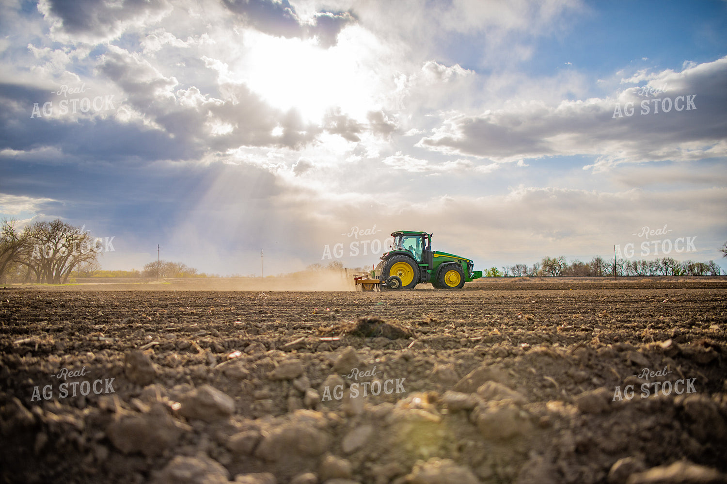 Tractor Rolls Field 56646
