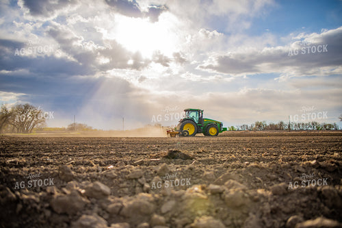 Tractor Rolls Field 56646