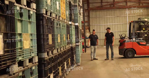 Input Supplier Walking by Seed Bins 8693