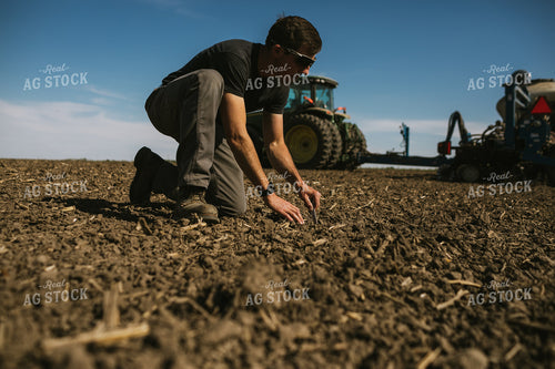Farmer Checking Seed Depth 4110