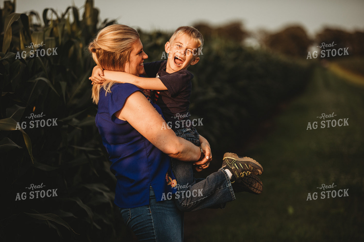 Farm Family Laughing next to Corn Field 4551
