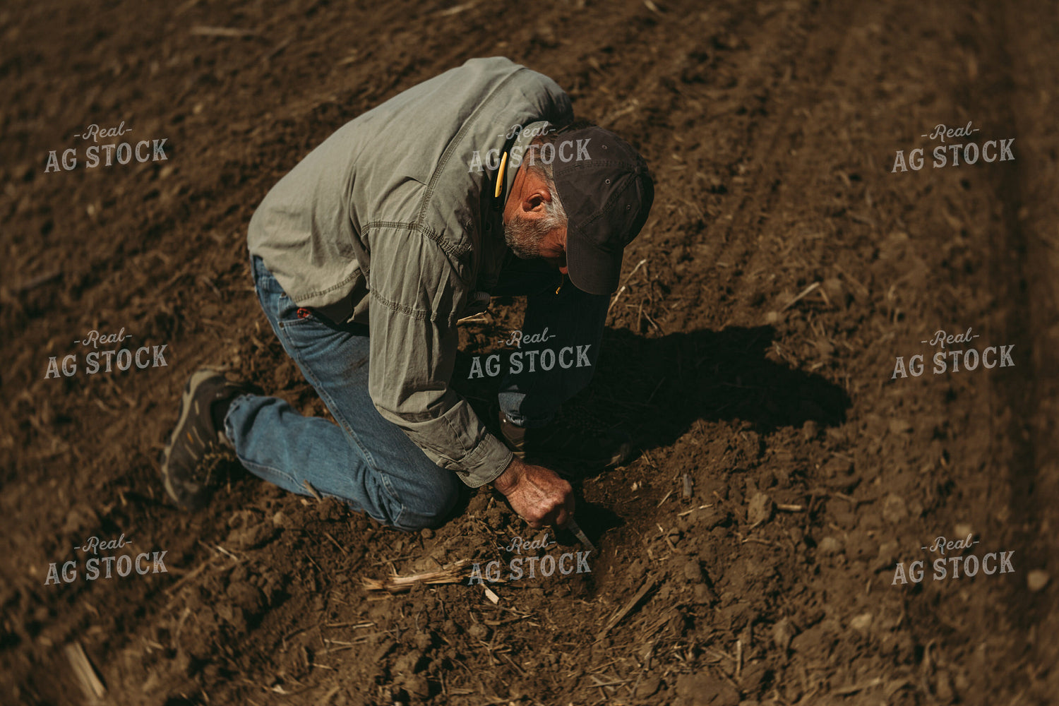 Farmer Checking Planting Depth 4006
